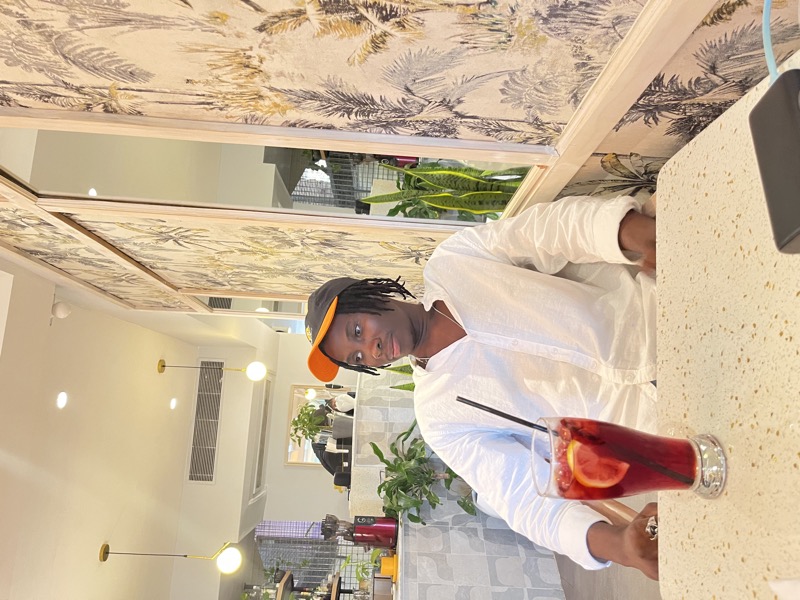 Prince at a cafe